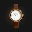 Inspired by contemporary Nordic minimalism. The NORDIC Copenhagen features a 36mm diameter white olive wood case with a white dial and gold details. Handmade from sustainably sourced wood and combined with an ultra soft beige sustainable vegan leather str