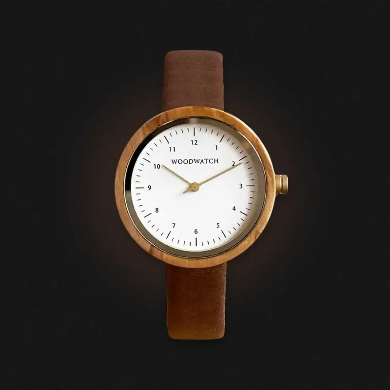 Inspired by contemporary Nordic minimalism. The NORDIC Copenhagen features a 36mm diameter white olive wood case with a white dial and gold details. Handmade from sustainably sourced wood and combined with an ultra soft beige sustainable vegan leather str