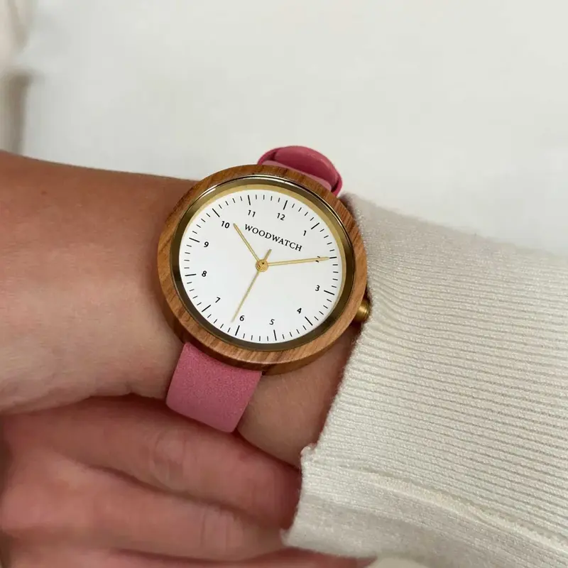 Inspired by contemporary Nordic minimalism. The NORDIC Copenhagen features a 36mm diameter white olive wood case with a white dial and gold details. Handmade from sustainably sourced wood and combined with an ultra soft beige sustainable vegan leather str