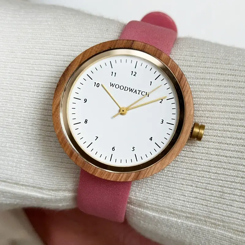 Inspired by contemporary Nordic minimalism. The NORDIC Copenhagen features a 36mm diameter white olive wood case with a white dial and gold details. Handmade from sustainably sourced wood and combined with an ultra soft beige sustainable vegan leather str