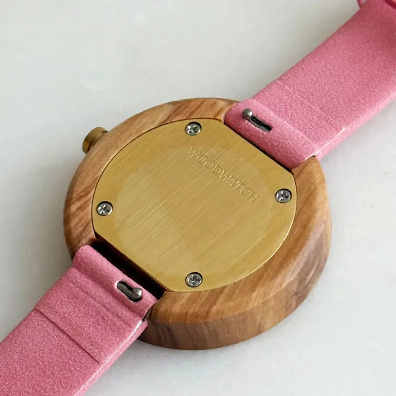 Inspired by contemporary Nordic minimalism. The NORDIC Copenhagen features a 36mm diameter white olive wood case with a white dial and gold details. Handmade from sustainably sourced wood and combined with an ultra soft beige sustainable vegan leather str