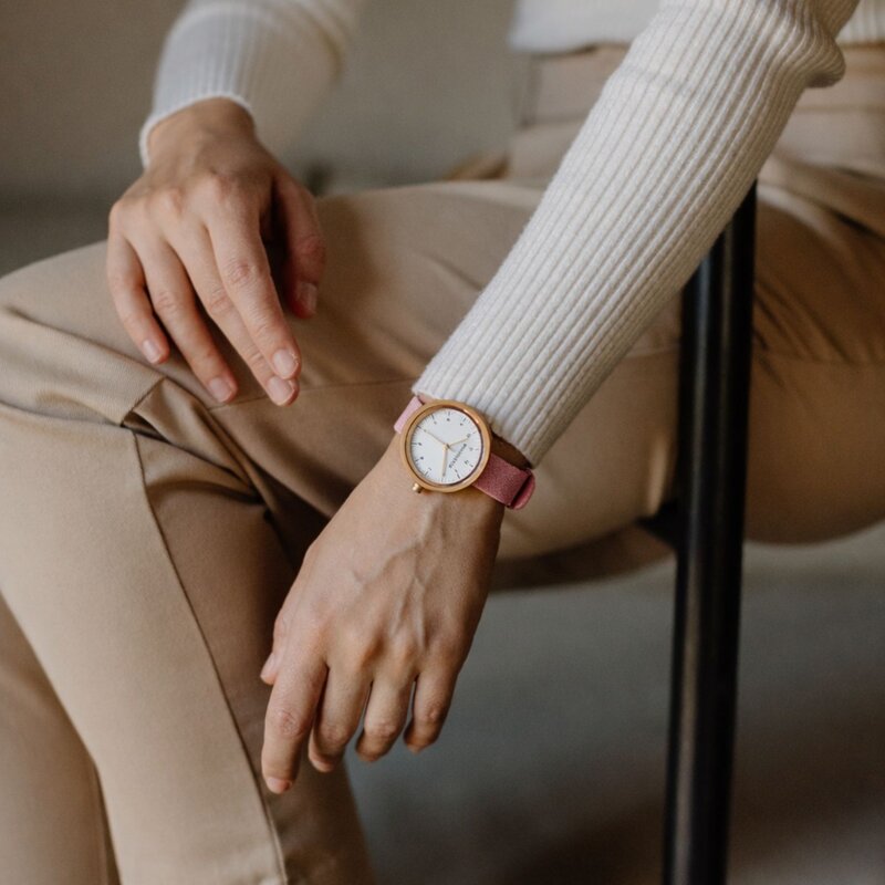Inspired by contemporary Nordic minimalism. The NORDIC Copenhagen features a 36mm diameter white olive wood case with a white dial and gold details. Handmade from sustainably sourced wood and combined with an ultra soft beige sustainable vegan leather str