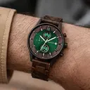 Verdant is made of Acacia wood, featuring a green dial.