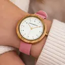 Inspired by contemporary Nordic minimalism. The NORDIC Copenhagen features a 36mm diameter white olive wood case with a white dial and gold details. Handmade from sustainably sourced wood and combined with an ultra soft beige sustainable vegan leather str