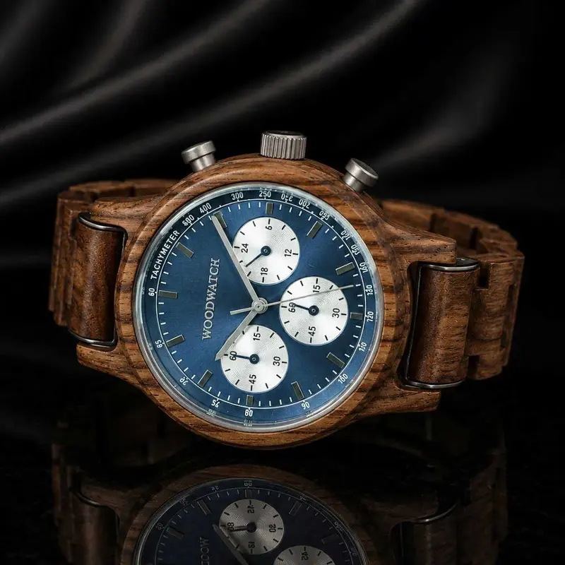 The Chrono Mariner Kosso is made from kosso wood and features a double layered blue dial with silver details.