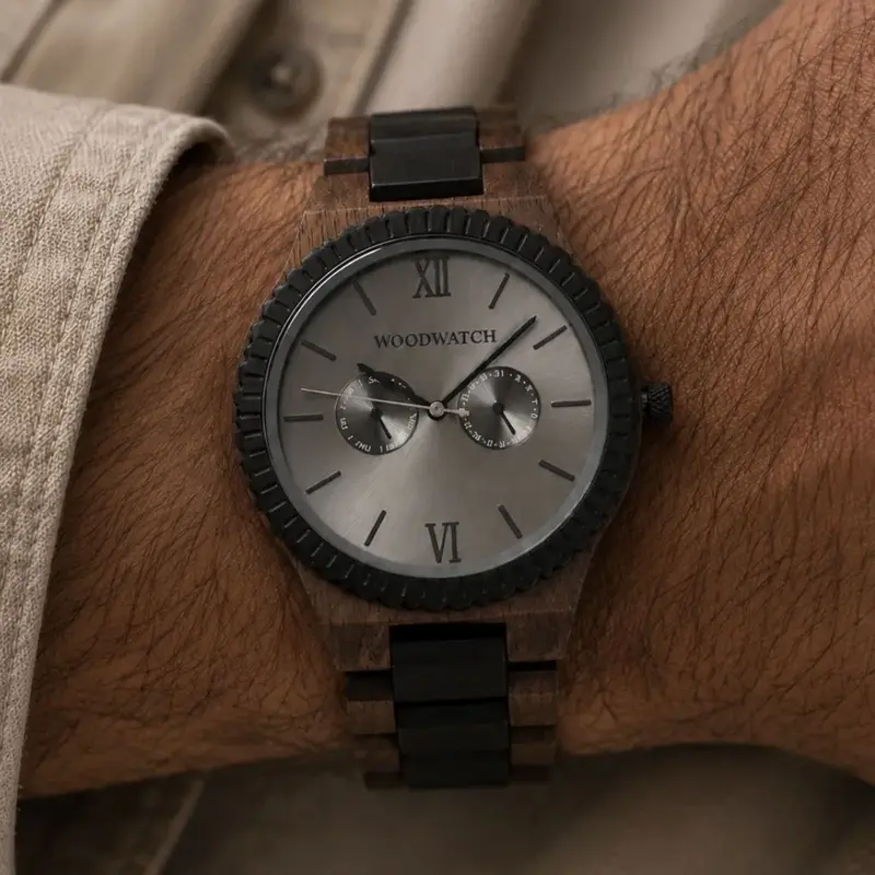 This premium designed watch combines unique new wood types with a luxurious stainless steel dial and backplate. At the heart of the timepiece comes an all new multi-function movement that includes two extra subdials featuring a week and month display. The