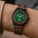 Verdant is made of Acacia wood, featuring a green dial.