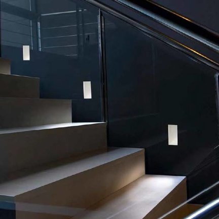 Trimless stair tread recessed wall fixtures