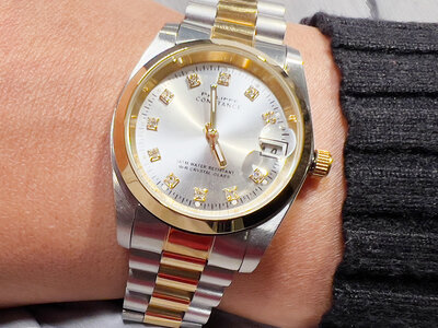 Stalen Philippe Constance Horloge Philippe Constance Stalen Dameshorloge - 7265 Medium - Goud- en Zilverkleur - Strass - Zilverkleurige metallic Wijzerplaat - Stalen Bicolor Schakelband - Datumaanduiding
