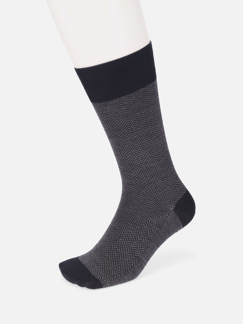 Halfhoge sokken van merinowol met visgraatmotief M