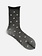 Transparente Socken mit Gänseblümchenmuster