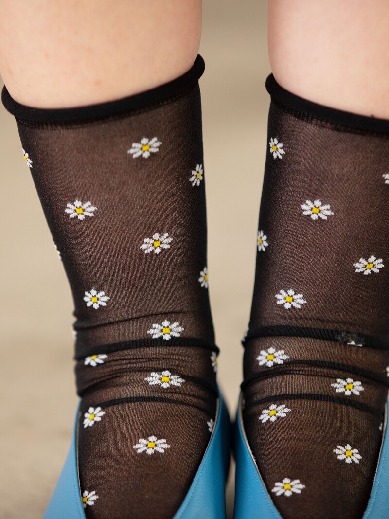 Mezze calze velate con fiori di margherita