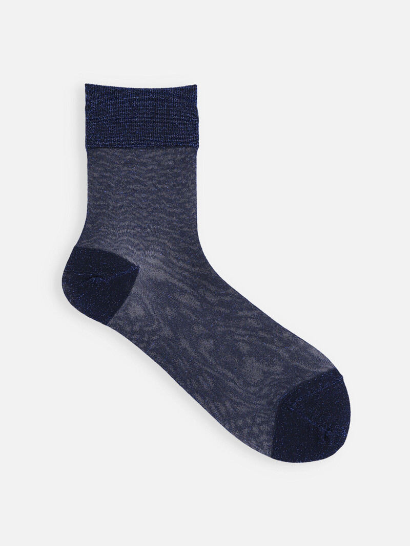 Calza in lamé semitrasparente
