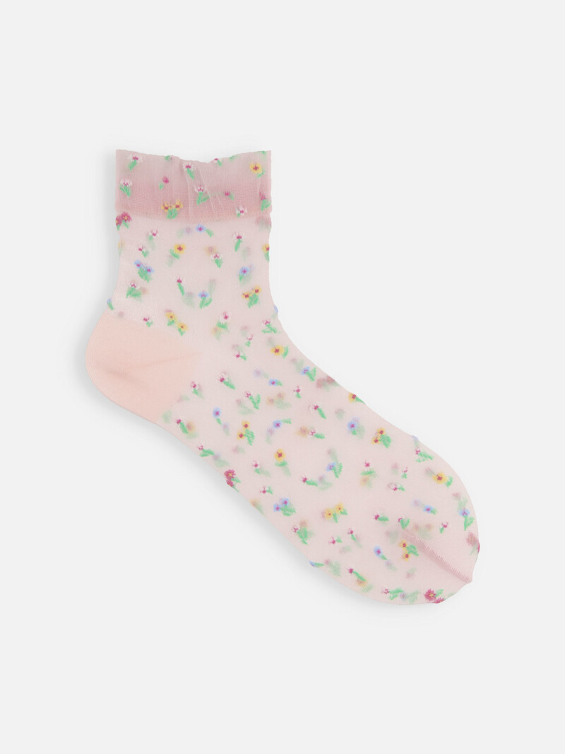 Meia de tule com estampa de pequenas flores