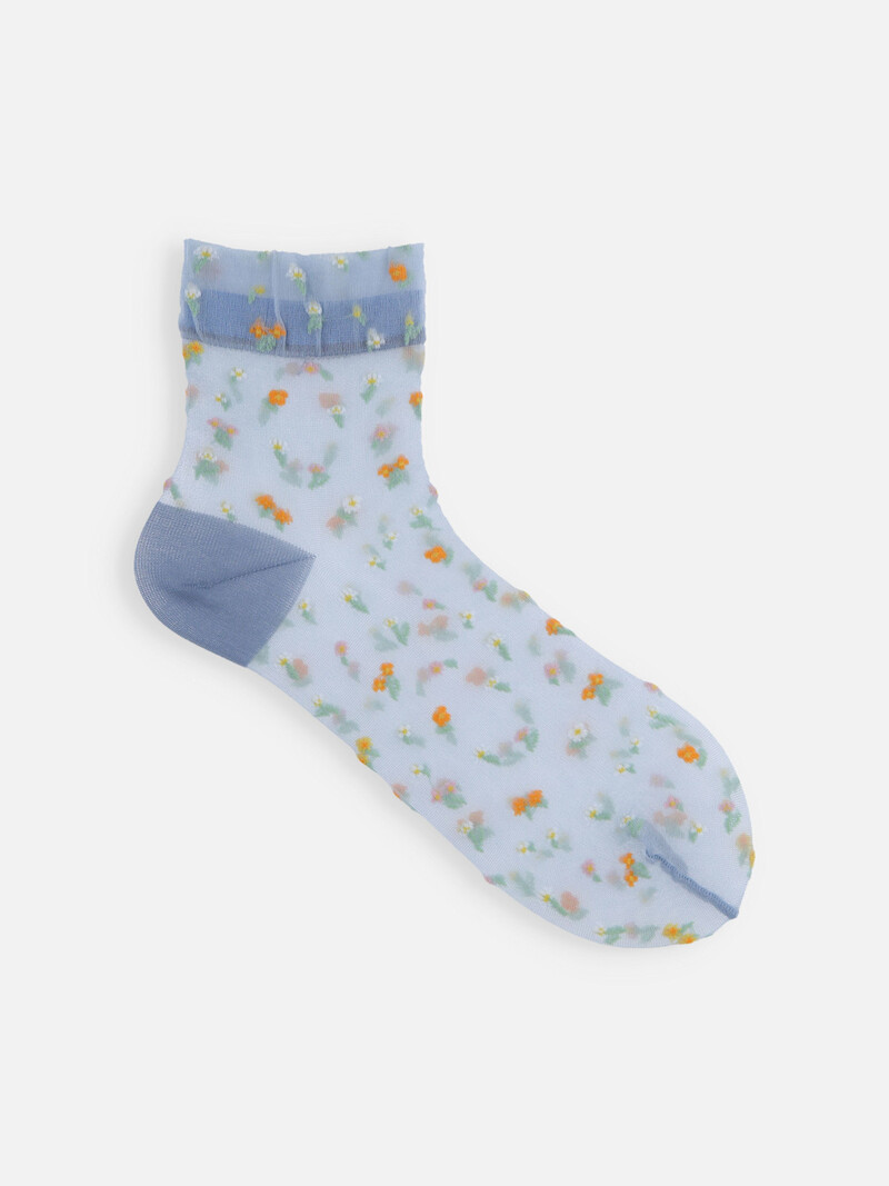 Meia de tule com estampa de pequenas flores