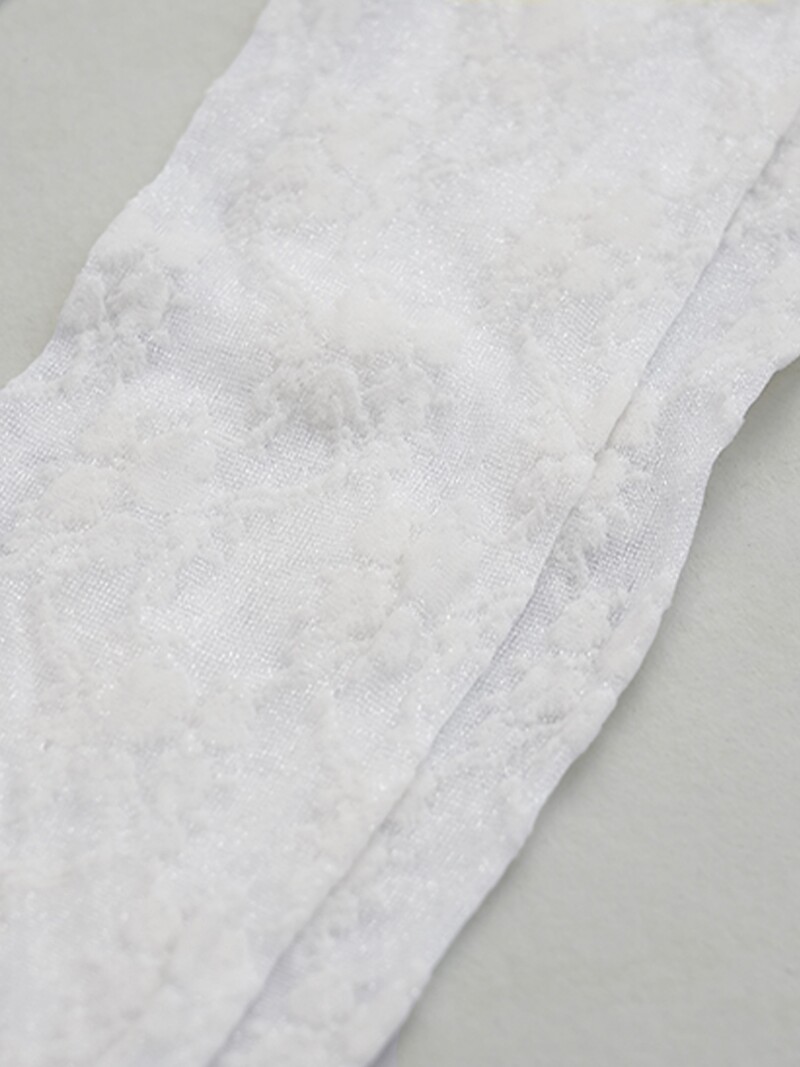Meia alta transparente com padrão floral