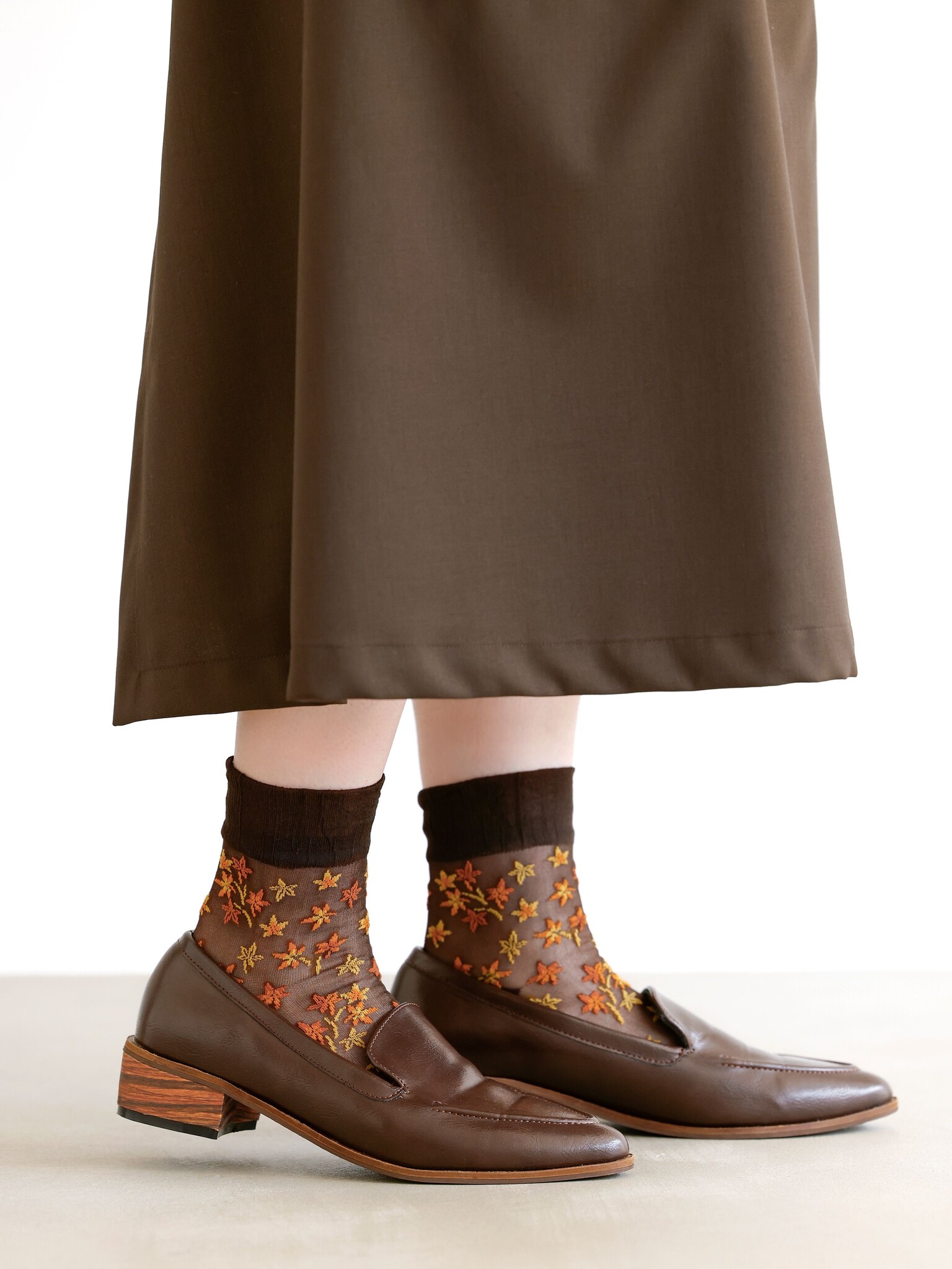 Meia transparente com estampa Momiji