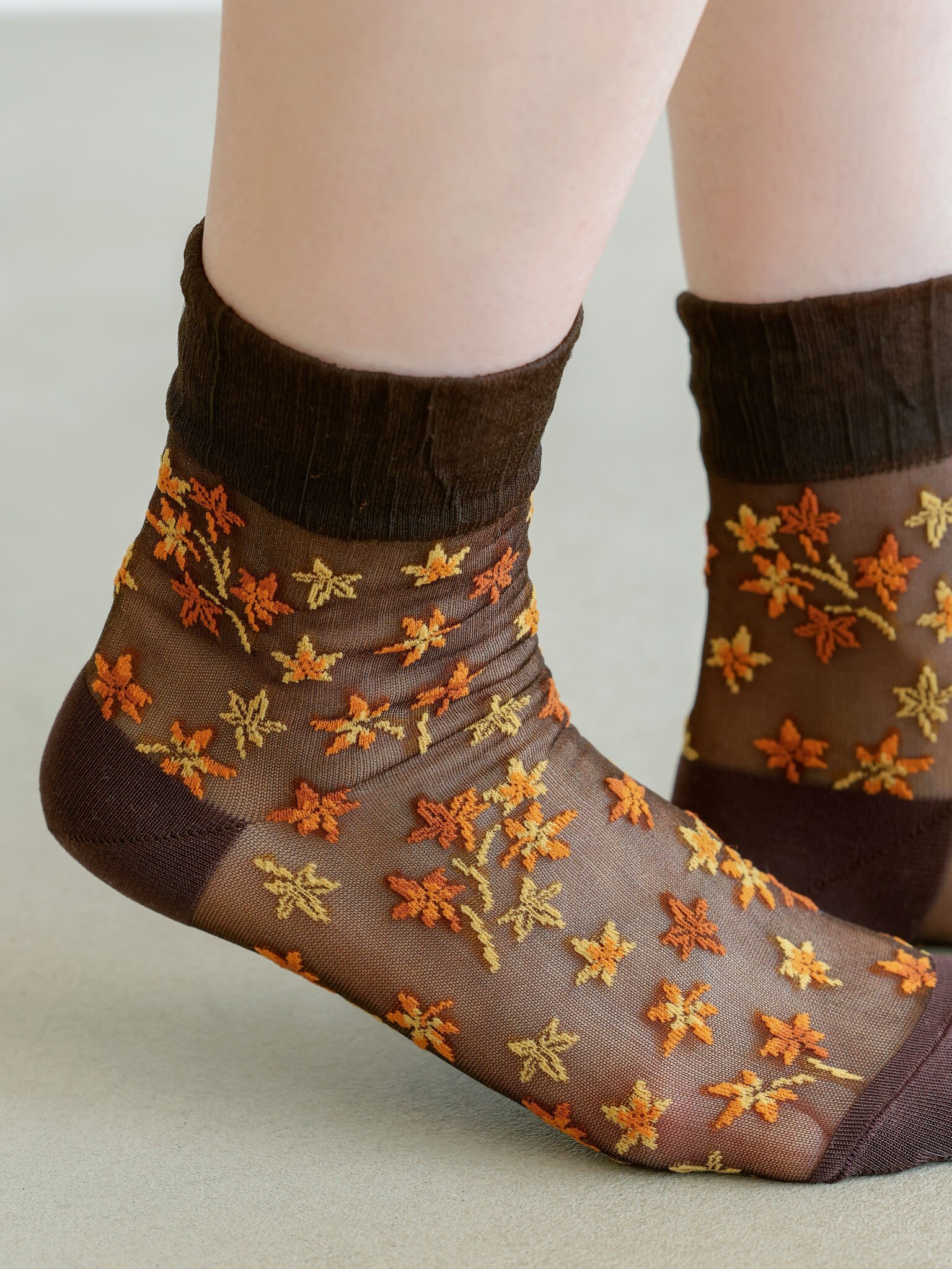 Meia transparente com estampa Momiji