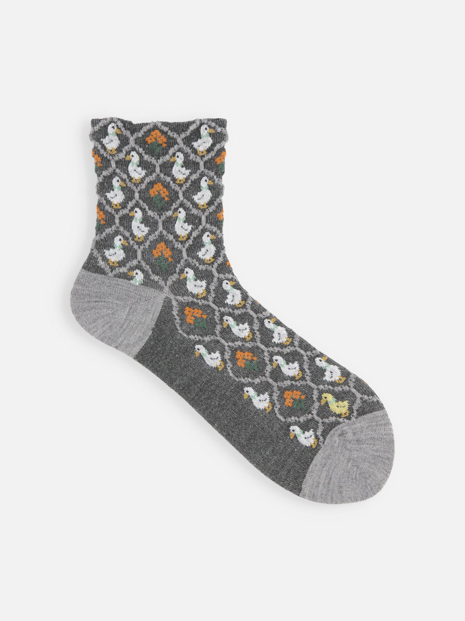 Lage sokken met wolmix en eendenmotief