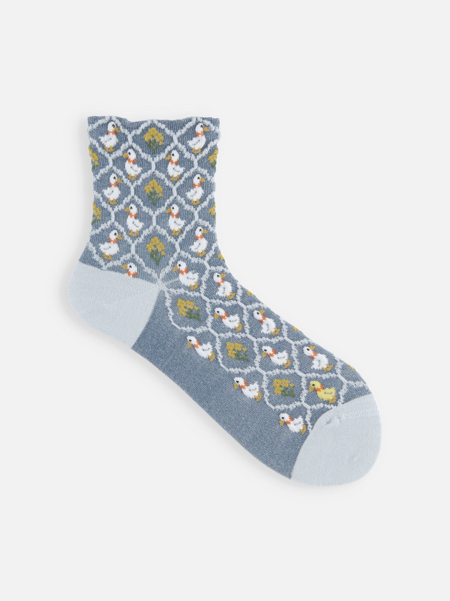Lage sokken met wolmix en eendenmotief