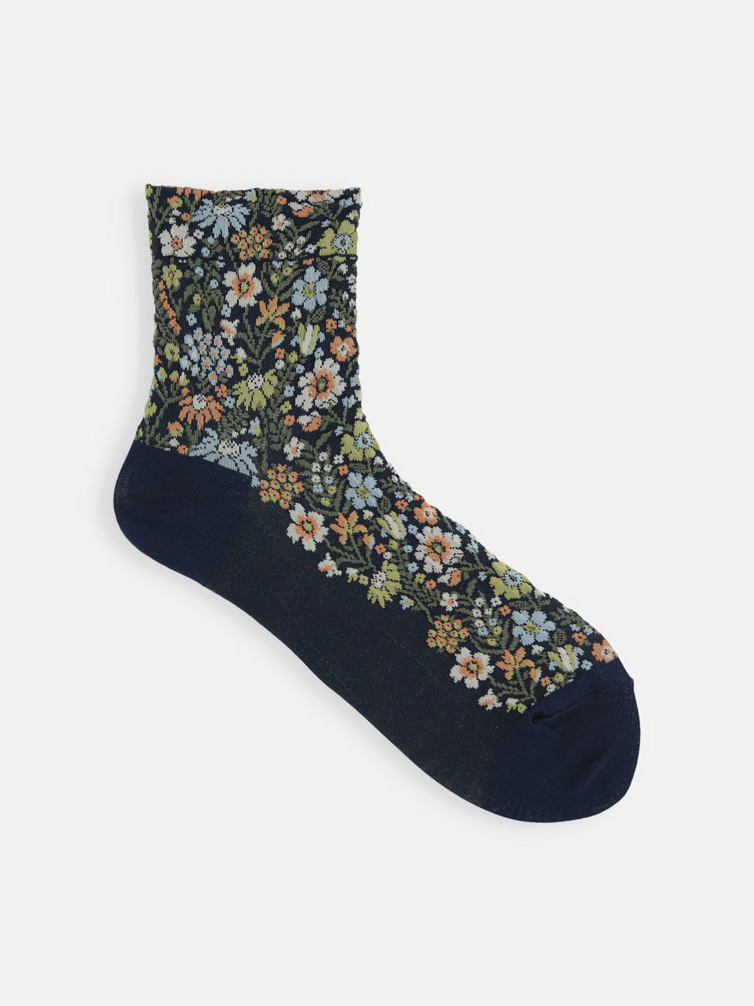 Meia com padrão botânico em relevo S