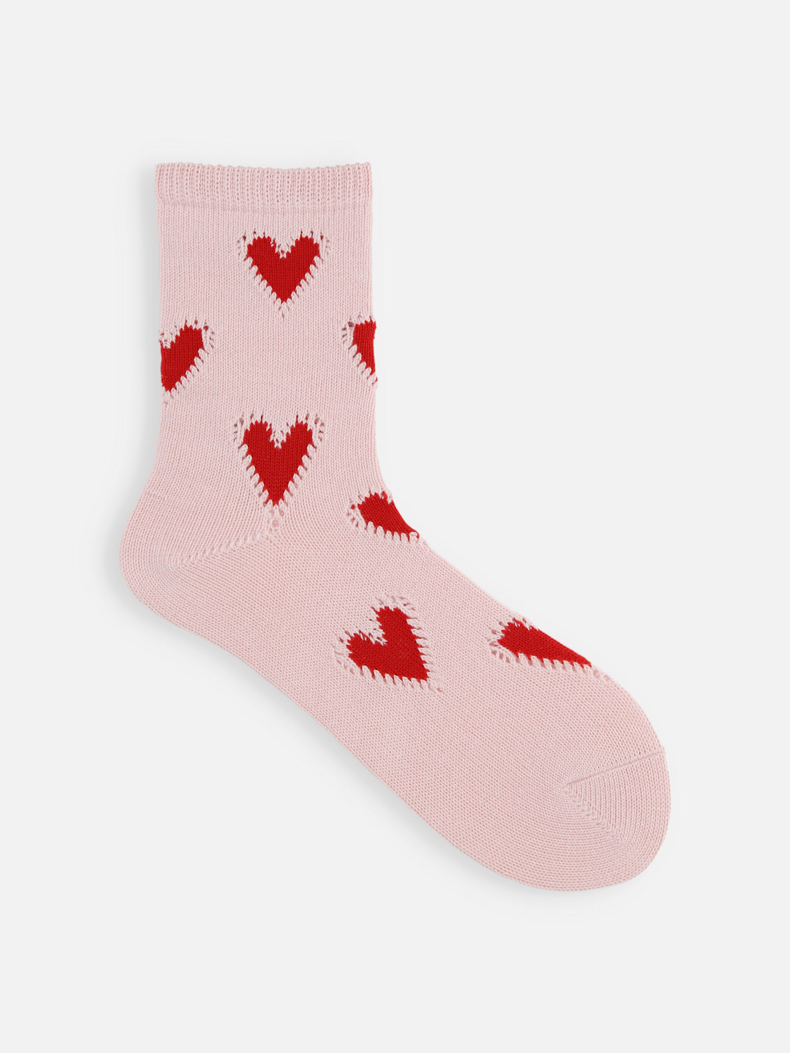 Meias de cano médio com bolinhas coloridas em formato de coração.