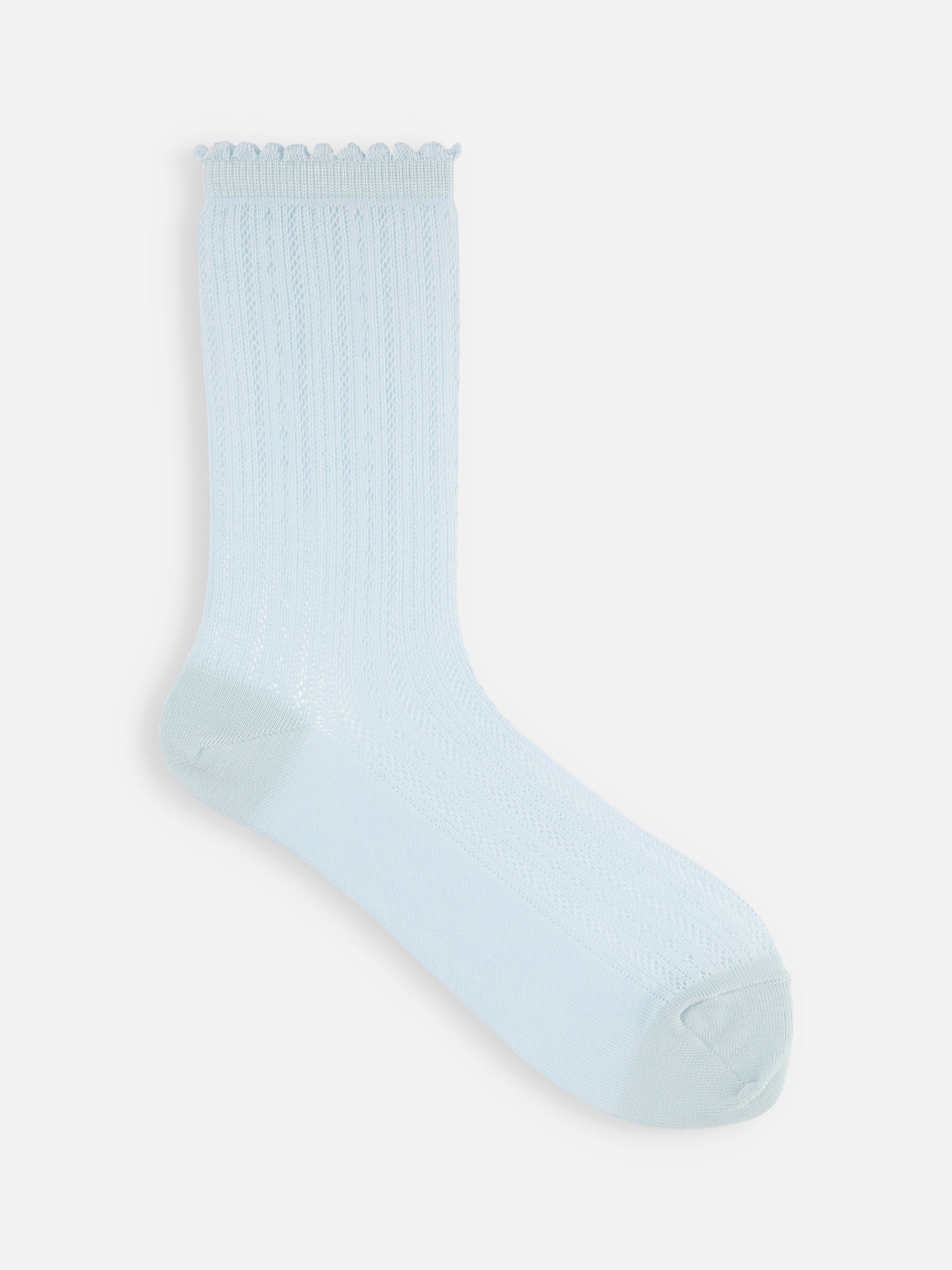 Meias até o joelho com padrão de renda e acabamento picot