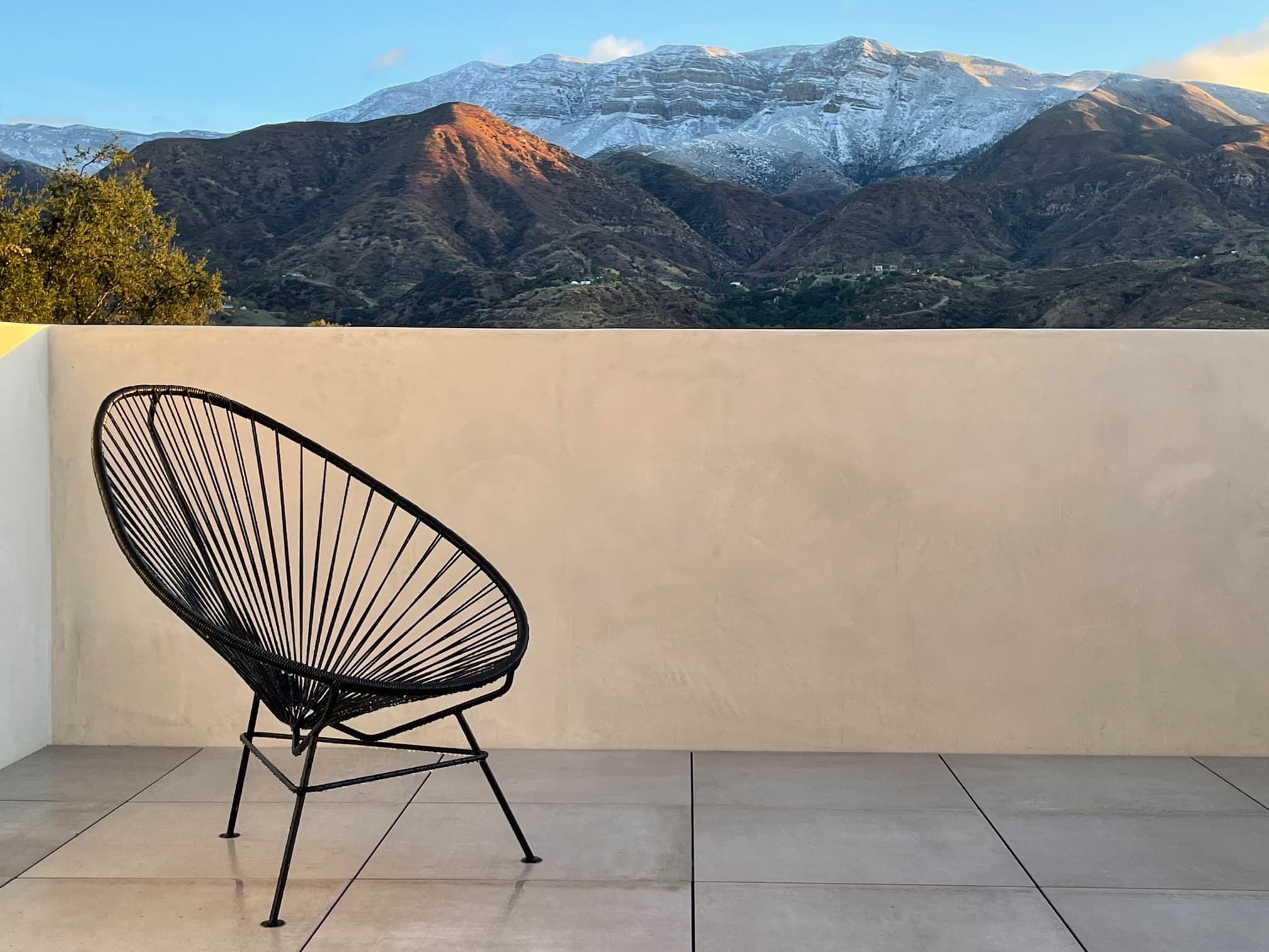 The Timeless Elegance of the Black Acapulco Chair