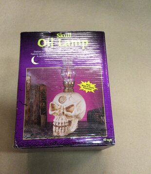 Lampe à huile crâne