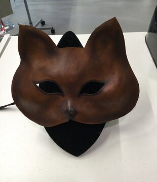 masker poes bruin leer