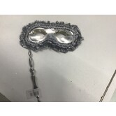 Mask on a stick, golden eyelashes