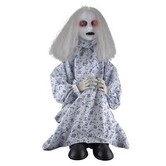 Sitting girl 75 cm light, sound and movement (battery NOT included)