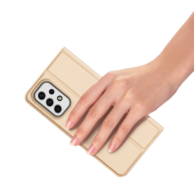 Dux Ducis - Telefoonhoesje geschikt voor Samsung Galaxy M23 - Skin Pro Book Case - Goud
