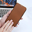 Dux Ducis - Hoes geschikt voor Apple iPhone 14 Pro - Magnetische sluiting - Book Case - Bruin