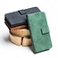 Case2go - Telefoonhoesje geschikt voor iPhone 15 - Wallet Book Case - Met Magnetische Sluiting - Groen