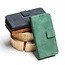 Case2go - Telefoonhoesje geschikt voor iPhone 15 Plus - Wallet Book Case - Met Magnetische Sluiting - Groen