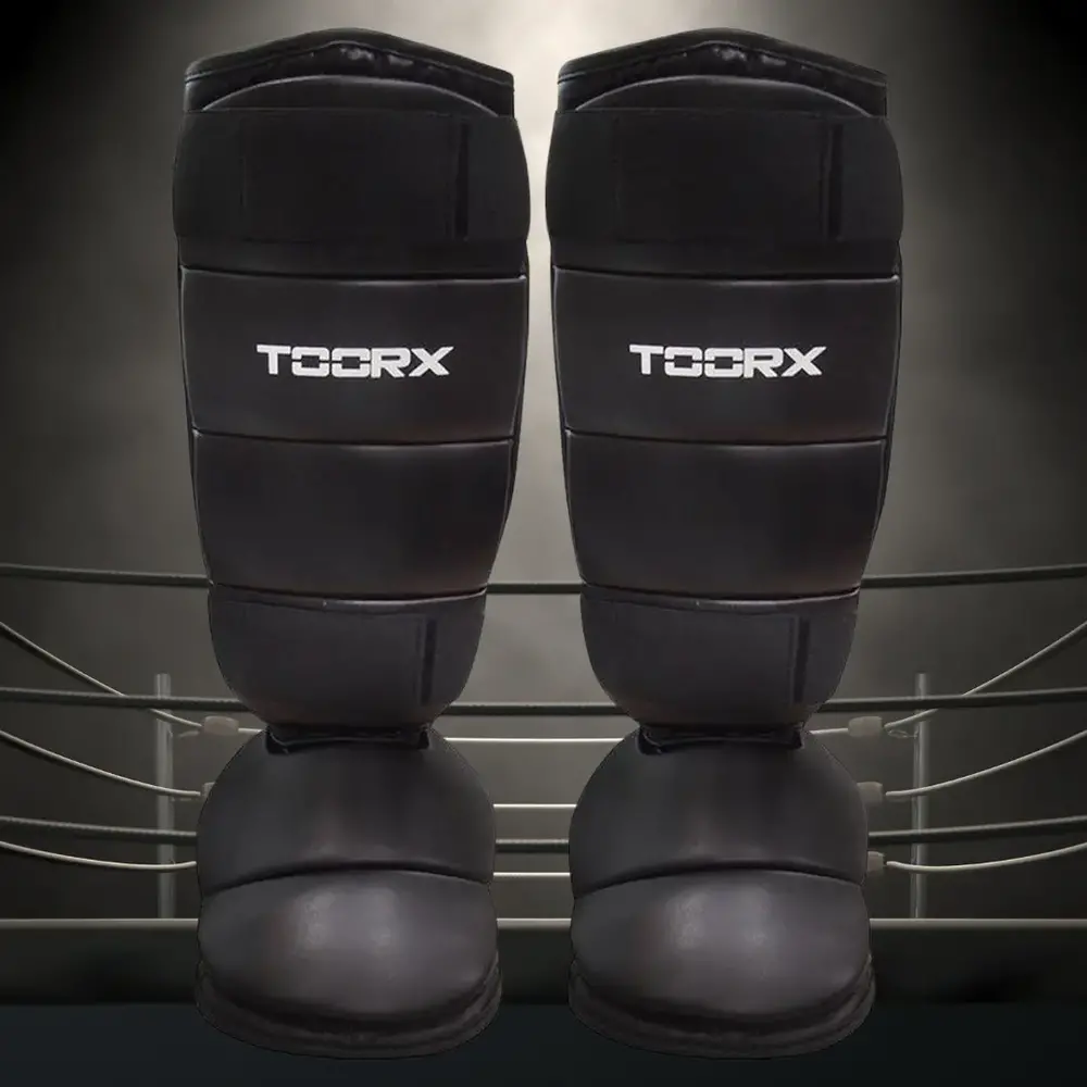 Toorx Fitness Scheenbeschermer PU - met voetbeschermer Toorx Fitness Scheenbeschermer PU - met voetbeschermer