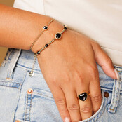 Gouden hartenring - Onyx edelsteen - Innerlijke kracht