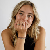 Ring - getwist randje - rode glassteen