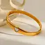 Goodies Stainless Steel Bangle met Parelmoer Hartje – Goudkleurige Armband
