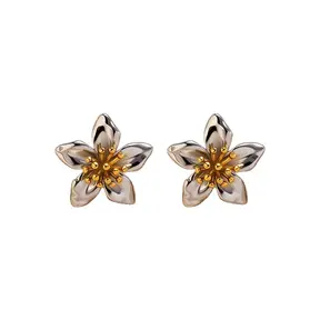 Stainless steel bloem oorbellen bicolor – goud/zilver statement studs