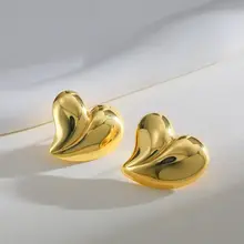 Stainless steel hart oorbellen goud – bolle statement studs