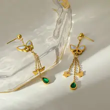 Stainless steel vlinder oorbellen met hanger – goudkleurige statement earrings