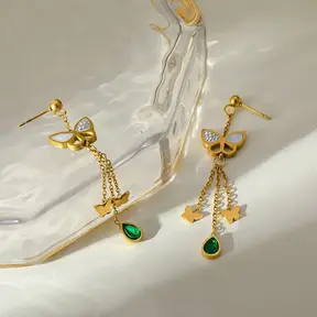 Stainless steel vlinder oorbellen met hanger – goudkleurige statement earrings