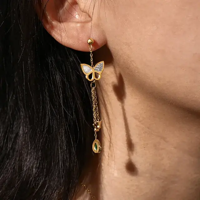 Stainless steel vlinder oorbellen met hanger – goudkleurige statement earrings