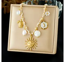 Stainless Steel Bedelketting Wit/Goud – Zon, Maan & Schelp – 40 cm + 5 cm Verlenging