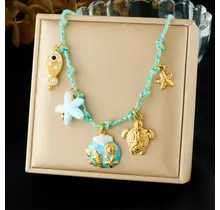 Stainless Steel Bedelketting Turquoise – Zeester, Schildpad & Zee Bedels – 40 cm + 5 cm Verlenging