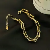 Stainless steel schakel armband goud/zilver – geometrische statement armband