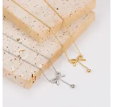 Stainless Steel Ketting Strikje met Steentje – Goud- en Zilverkleurig