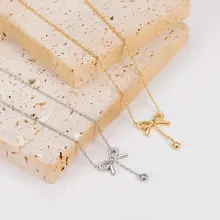 Stainless Steel Ketting Strikje met Steentje – Goud- en Zilverkleurig